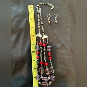 Purple and red necklace and earrings with silver accent